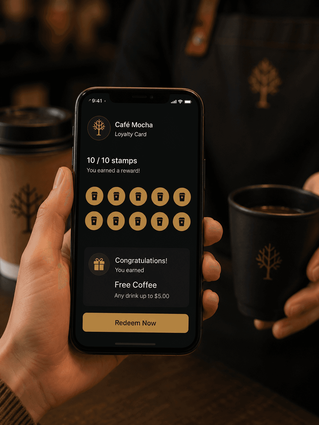 Customer's phone showing a completed Qafey loyalty card with the 'Redeem' reward ready to claim at the café counter.